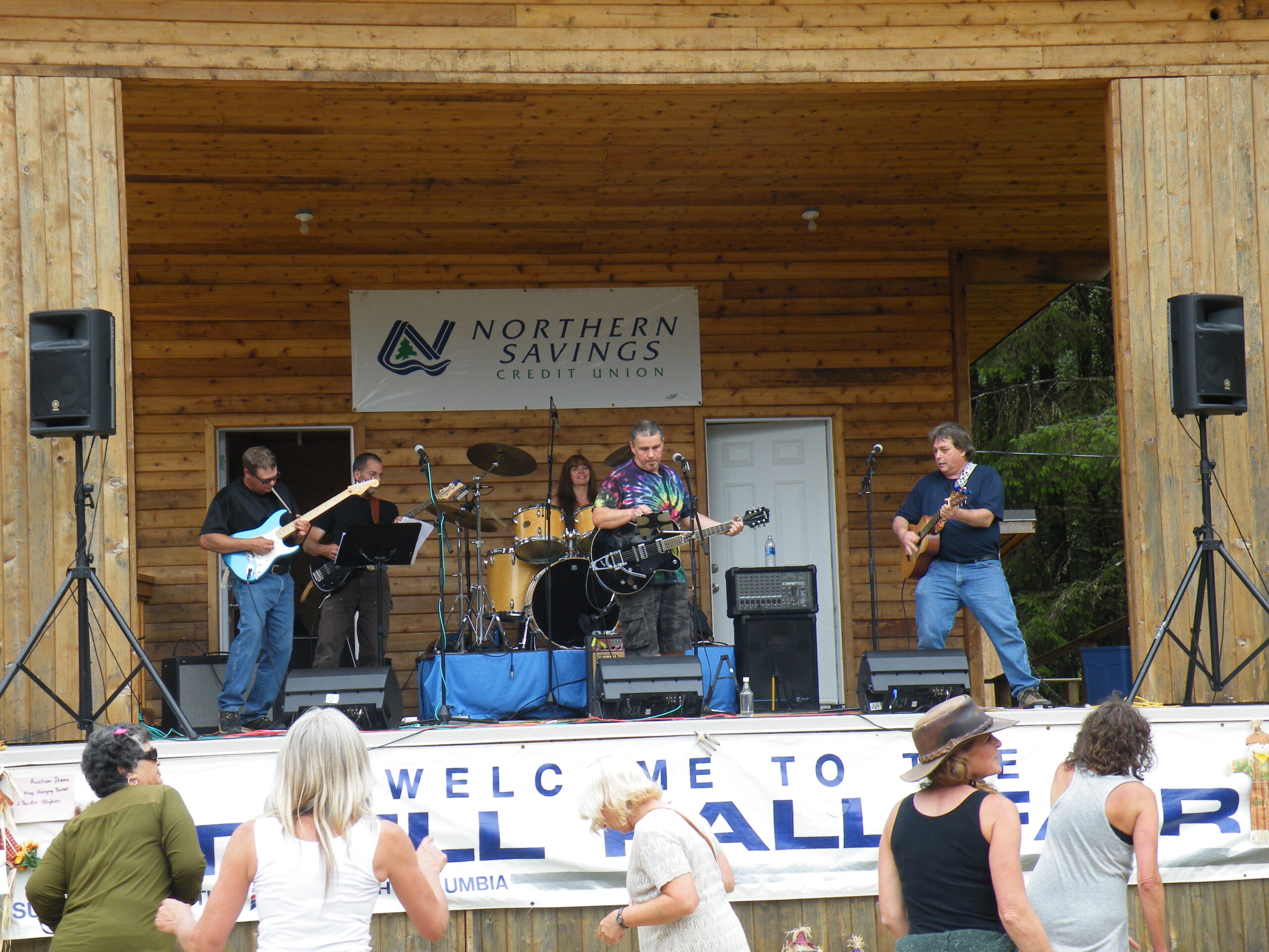 Out of the Blue performers with dancers in front at the Tlell Fall Fair